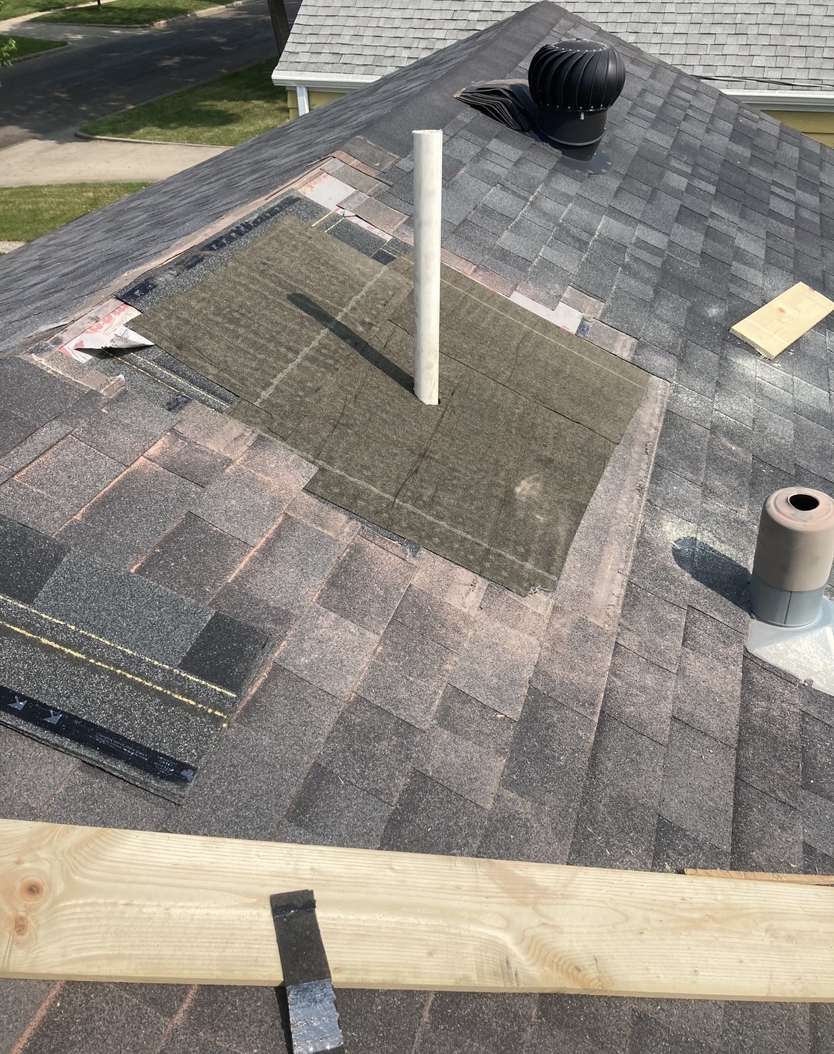 Roof deck repair during chimney removal