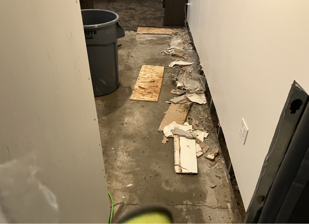 Water-damaged materials before cleanup
