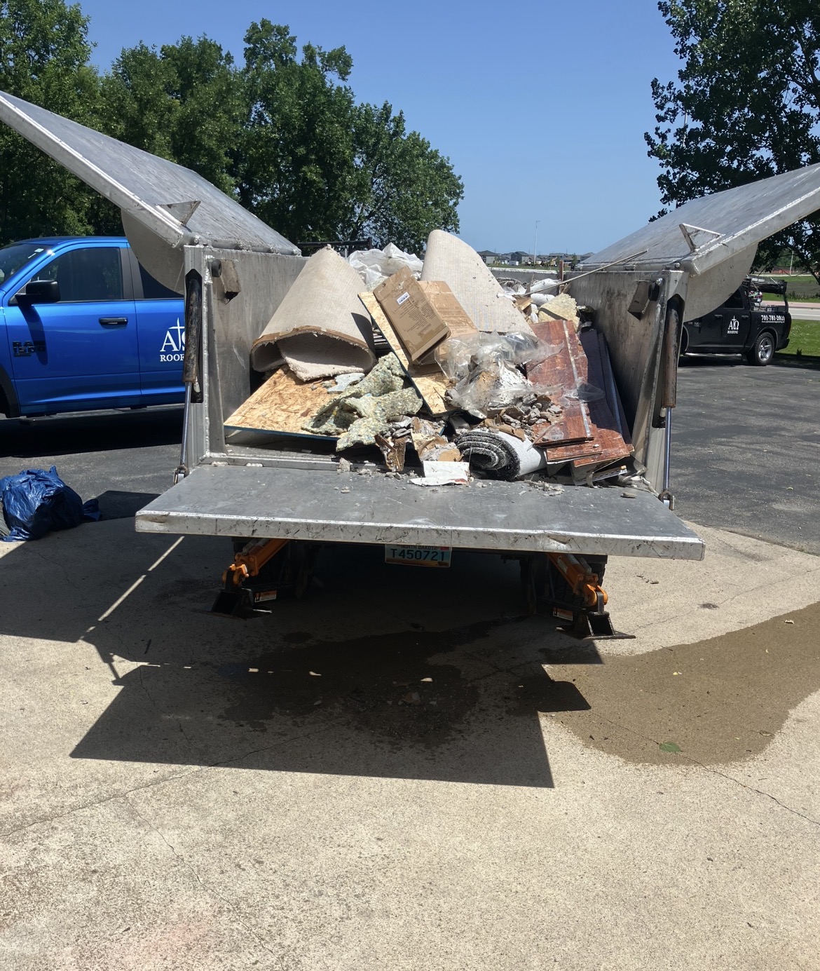 Water-damage cleanup debris loaded for removal